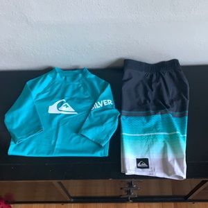 Boys Quiksilver board shorts and sun shirt